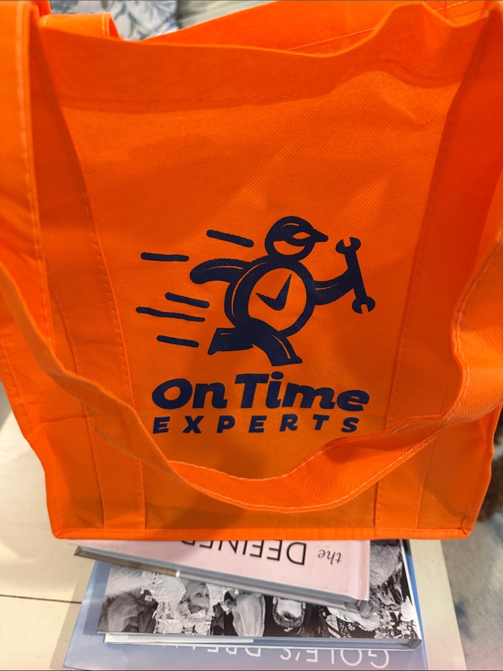 “ THE ON TIME EXPERTS”  - Bright Orange Tote Bag 👜